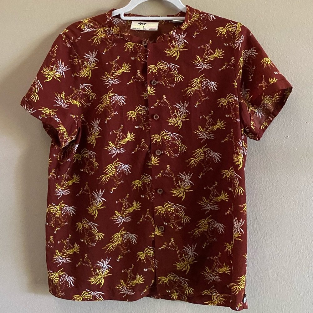Women’s top with palm trees
